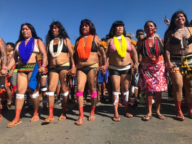 Indigenous women march toward Brazil’s National Congress during the Free Land Encampment in Brasilia on April, 26, 2019. Image by Karla Mendes / Mongabay