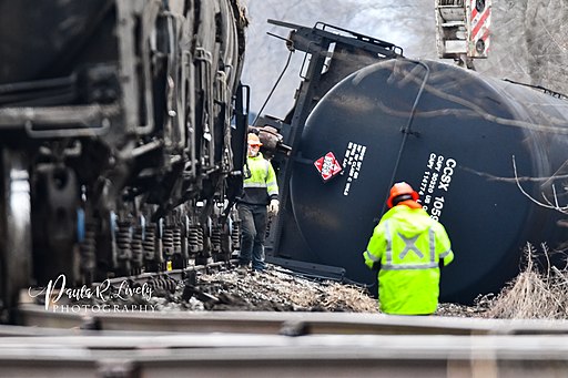 Damage control workers in 2023 train derailment in Trinway, Ohio USA. Paula R. Lively, CC BY 2.0, via Wikimedia Commons.