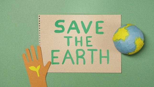 Close-Up Shot of "Save the Earth" Paper Cutouts on a Green Surface. Photo by Artem Podrez: https://www.pexels.com/photo/close-up-shot-of-paper-cutouts-on-a-green-surface-7048039/